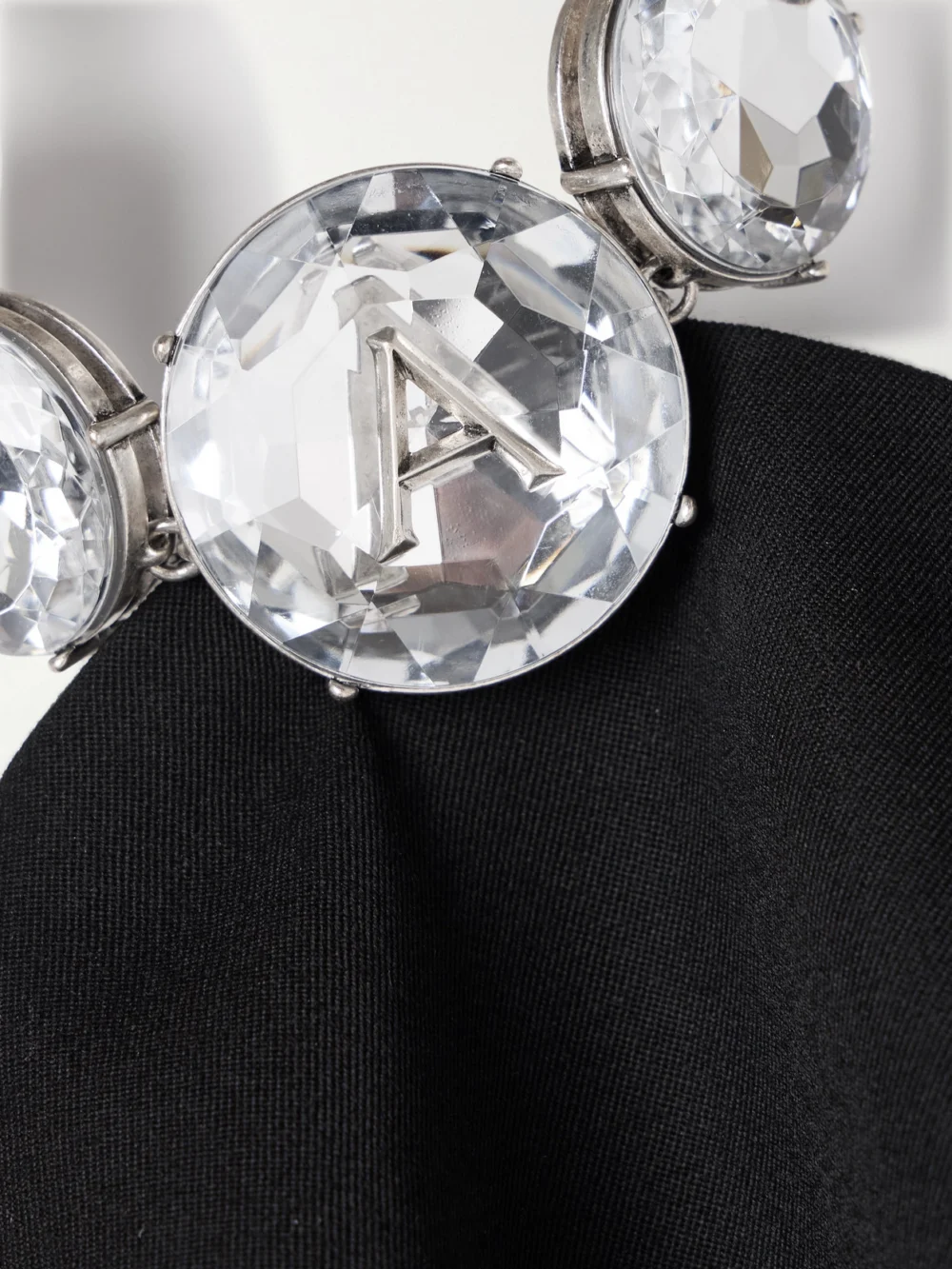 Close-up detail of the Area Embellished Wool-twill Halterneck Mini Dress