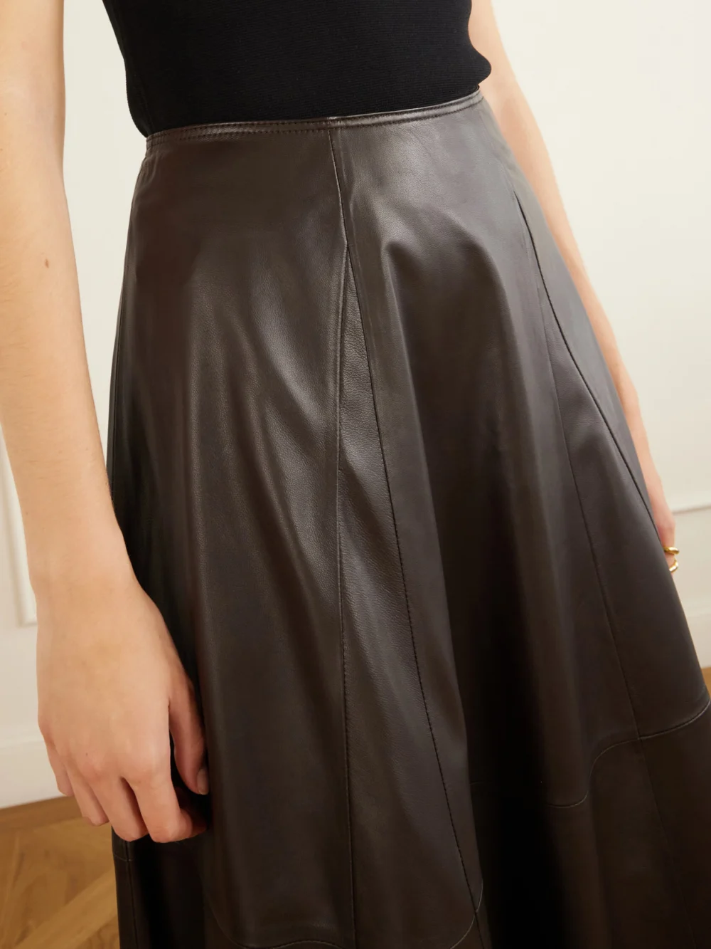 Close-up detail of the Arma Eleni Paneled Leather Midi Skirt