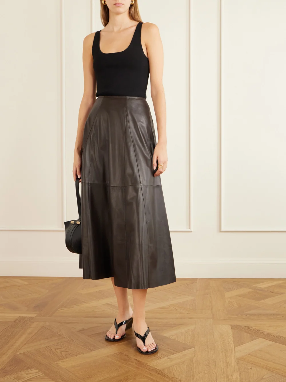 Arma Eleni Paneled Leather Midi Skirt, worn by a model