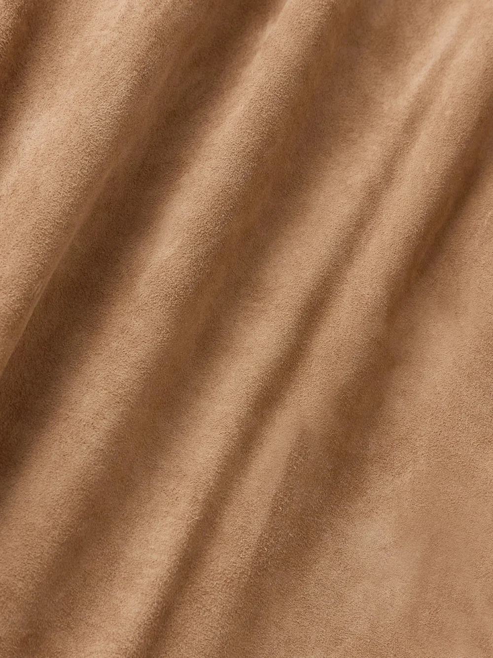 Close-up detail of the Arma Jina Paneled Suede Shorts