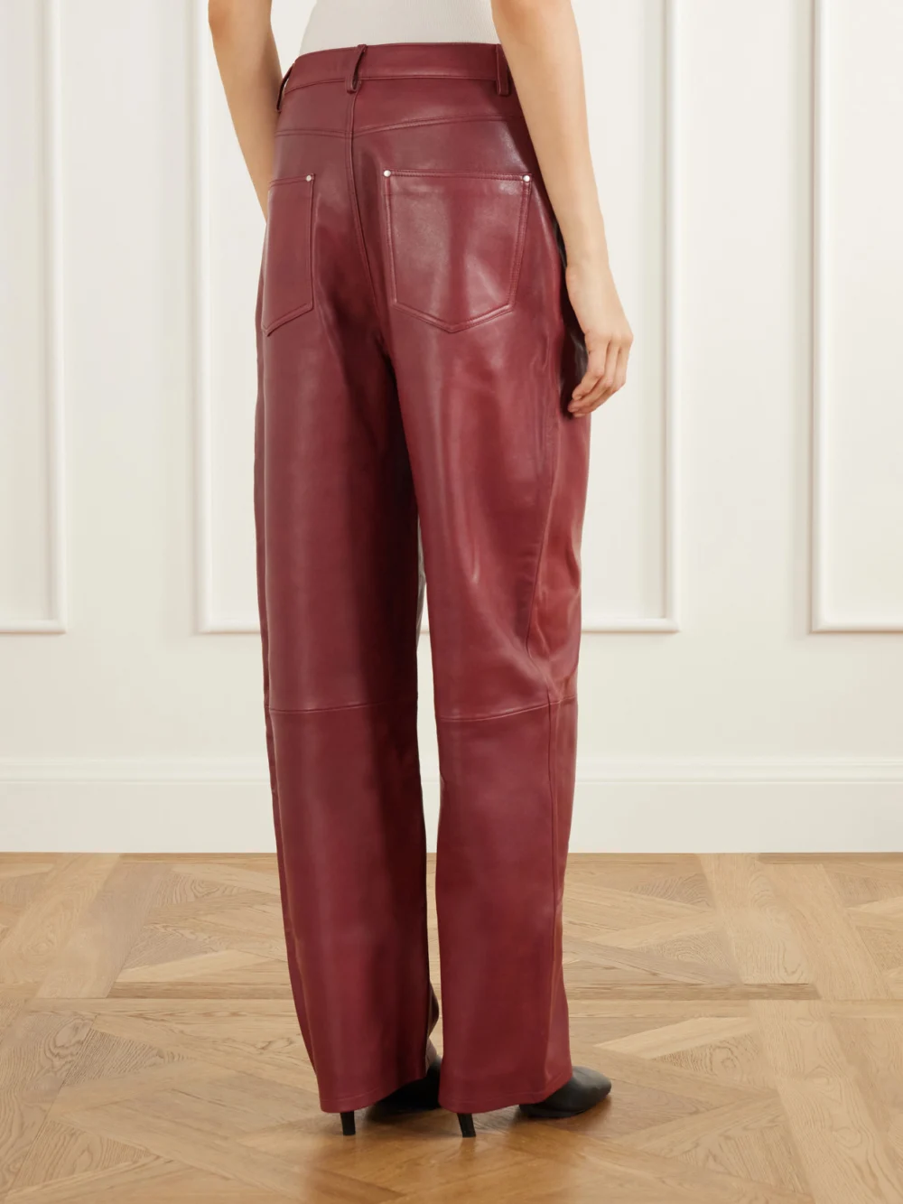 Back view of the Arma Leather Wide-leg Pants