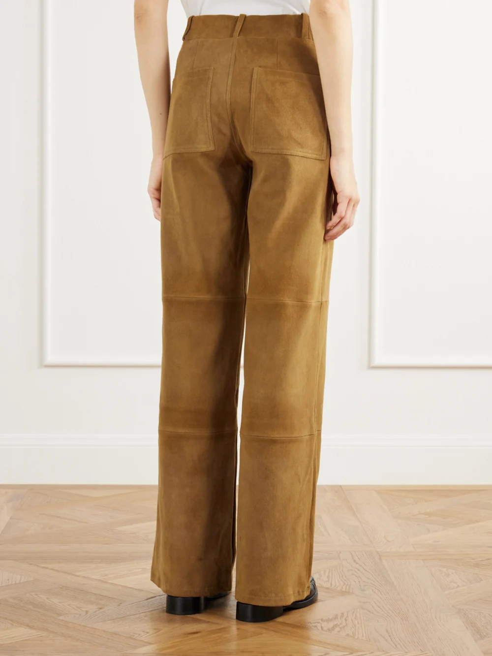 Back view of the Arma Marina Paneled Stretch Suede Wide-leg Pants