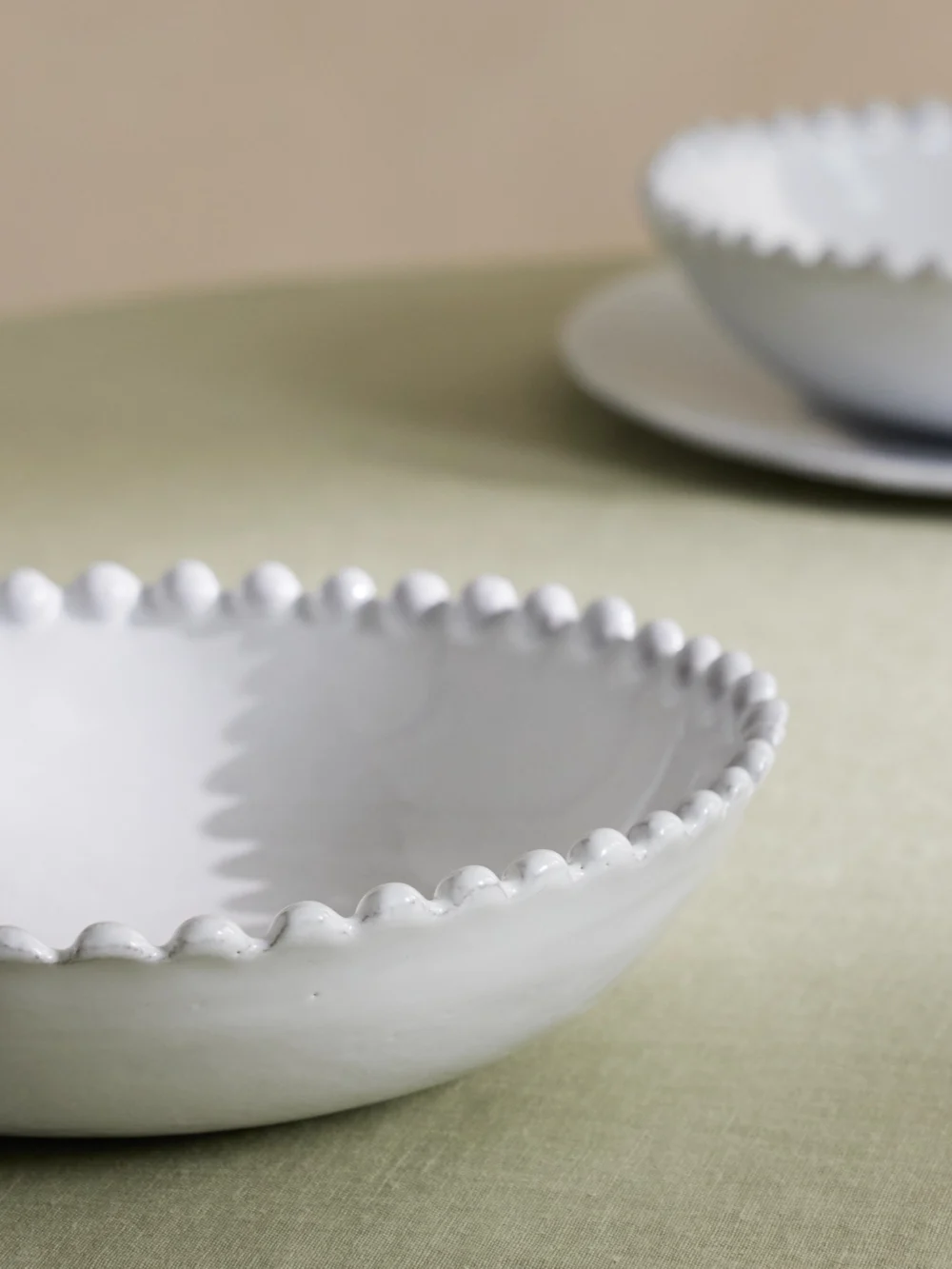 Close-up detail of the Astier De Villatte Adélaïde Ceramic Soup Plate