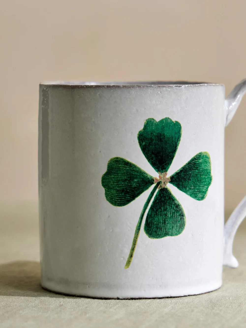 Close-up detail of the Astier De Villatte + John Derian Clover Glazed Ceramic Mug