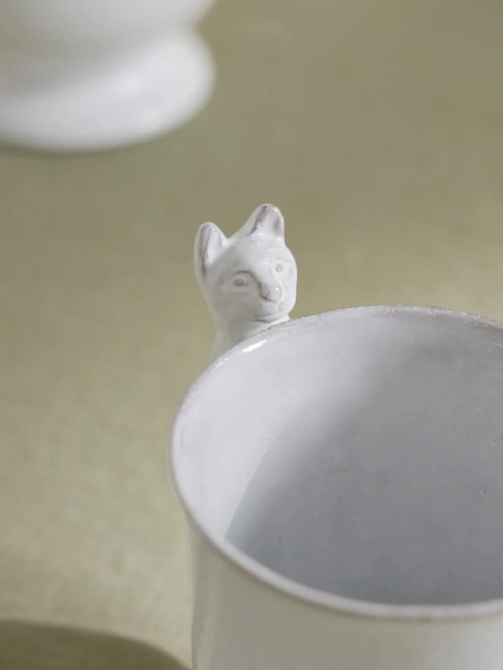 Close-up detail of the Astier De Villatte + Setsuko Cat Ceramic Cup