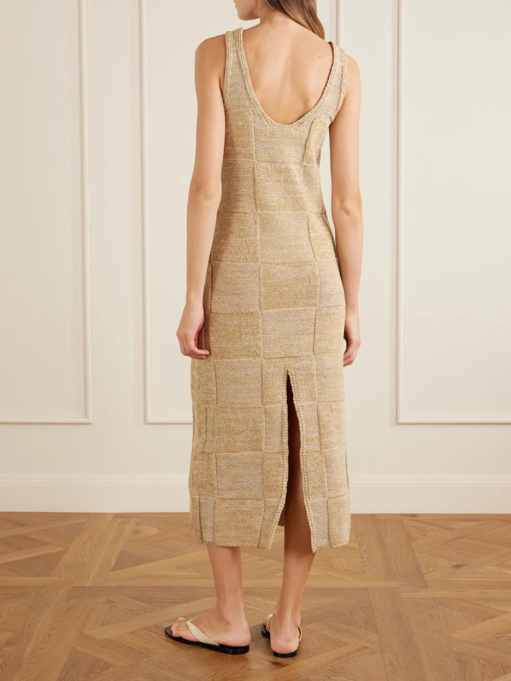 Back view of the Auralee Paneled Cotton and Linen-blend Knitted Midi Dress