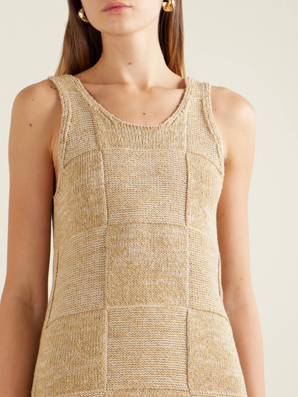 Close-up detail of the Auralee Paneled Cotton and Linen-blend Knitted Midi Dress