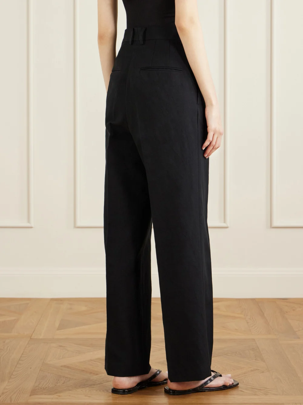Back view of the Auralee Pleated Wool, Cotton and Linen-blend Oxford Wide-leg Pants