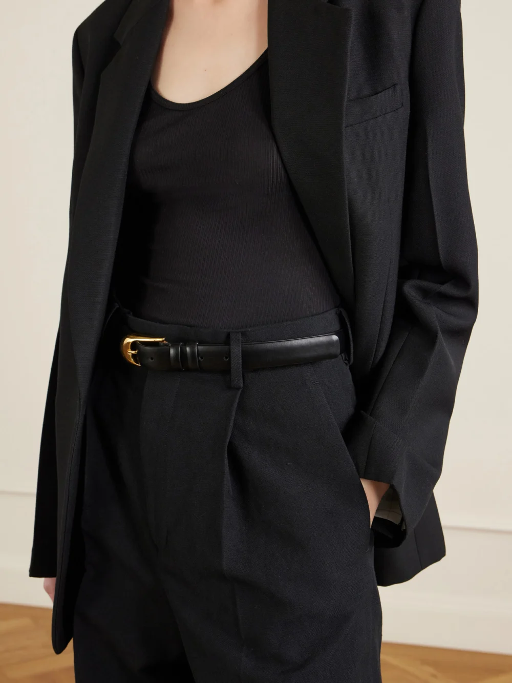 Close-up detail of the Auralee Pleated Wool, Cotton and Linen-blend Oxford Wide-leg Pants