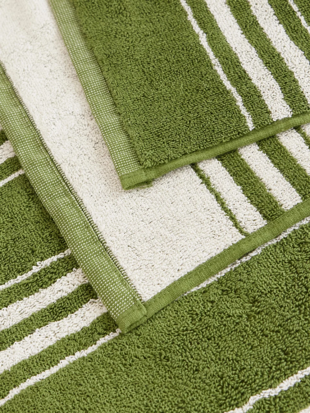 Close-up detail of the Autumn Sonata Charlotte Striped Organic Cotton-terry Beach Towel