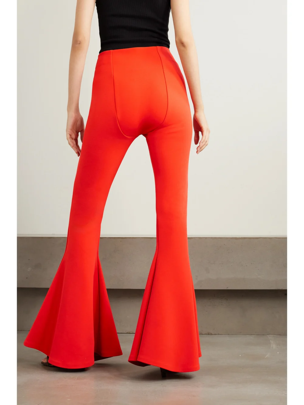 Back view of the A.W.A.K.E. Mode Draped Stretch-twill Flared Pants