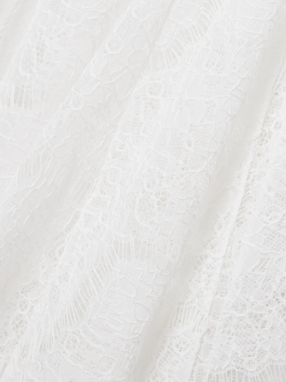 Close-up detail of the A.W.A.K.E. Mode Recycled-lace Maxi Skirt