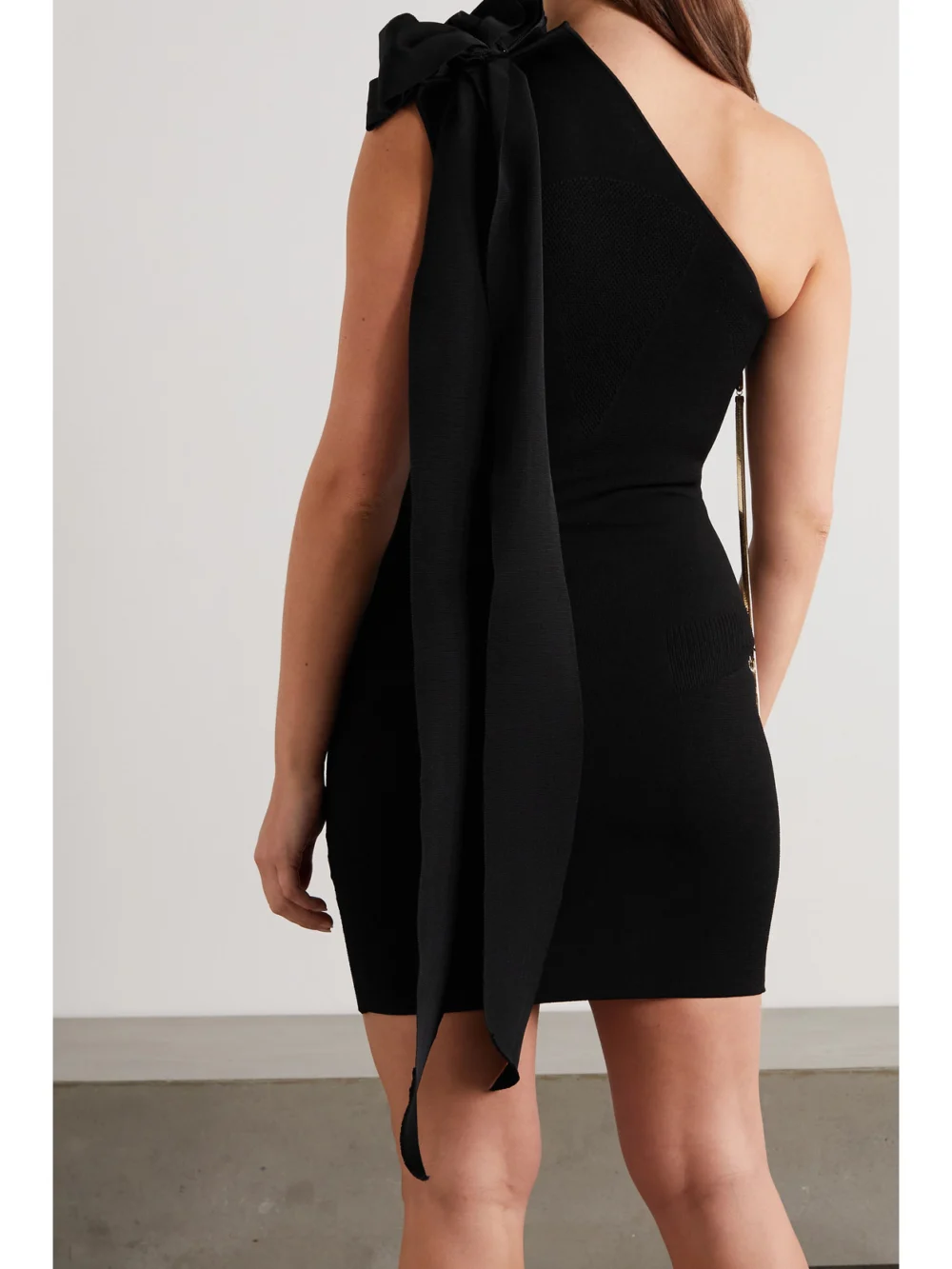 Back view of the Az Factory Mybody One-shoulder Bow-detailed Stretch-knit Mini Dress