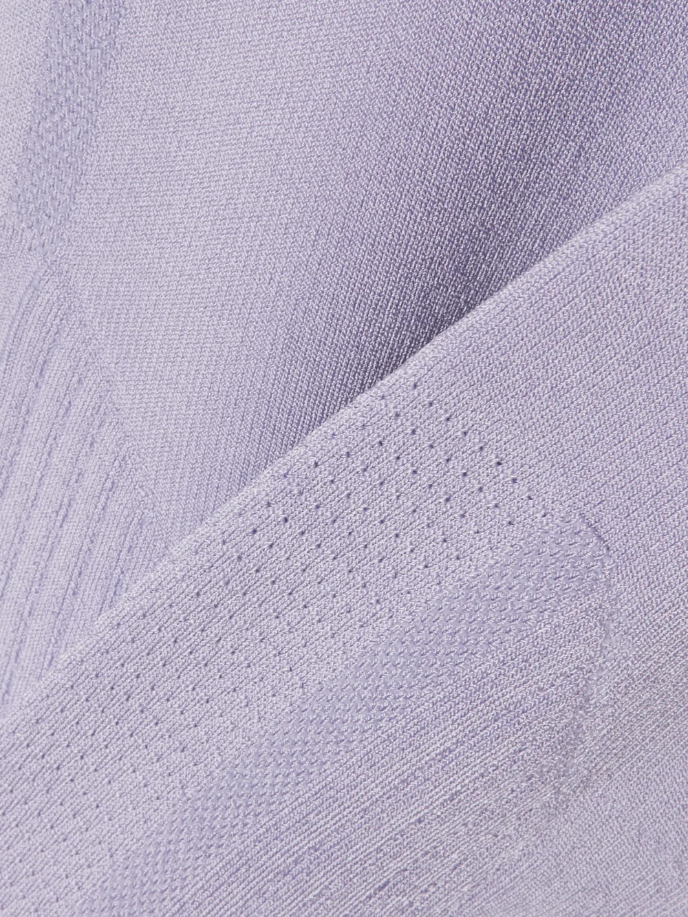 Close-up detail of the Az Factory Mybody Paneled Stretch-knit Leggings