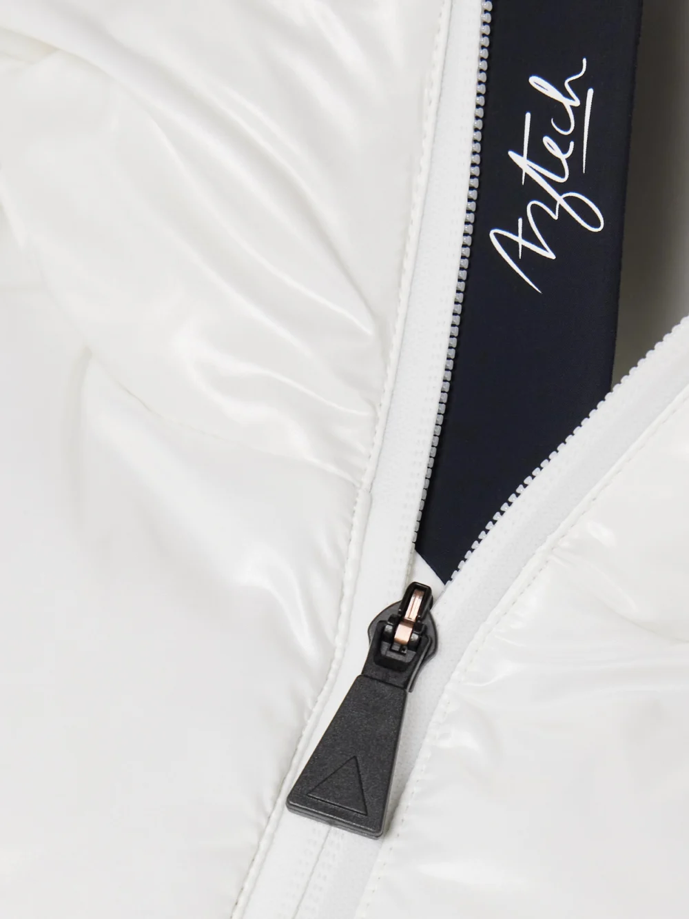 Close-up detail of the Aztech Mountain Daisy Nuke Hooded Padded Metallic Down Ski Jacket