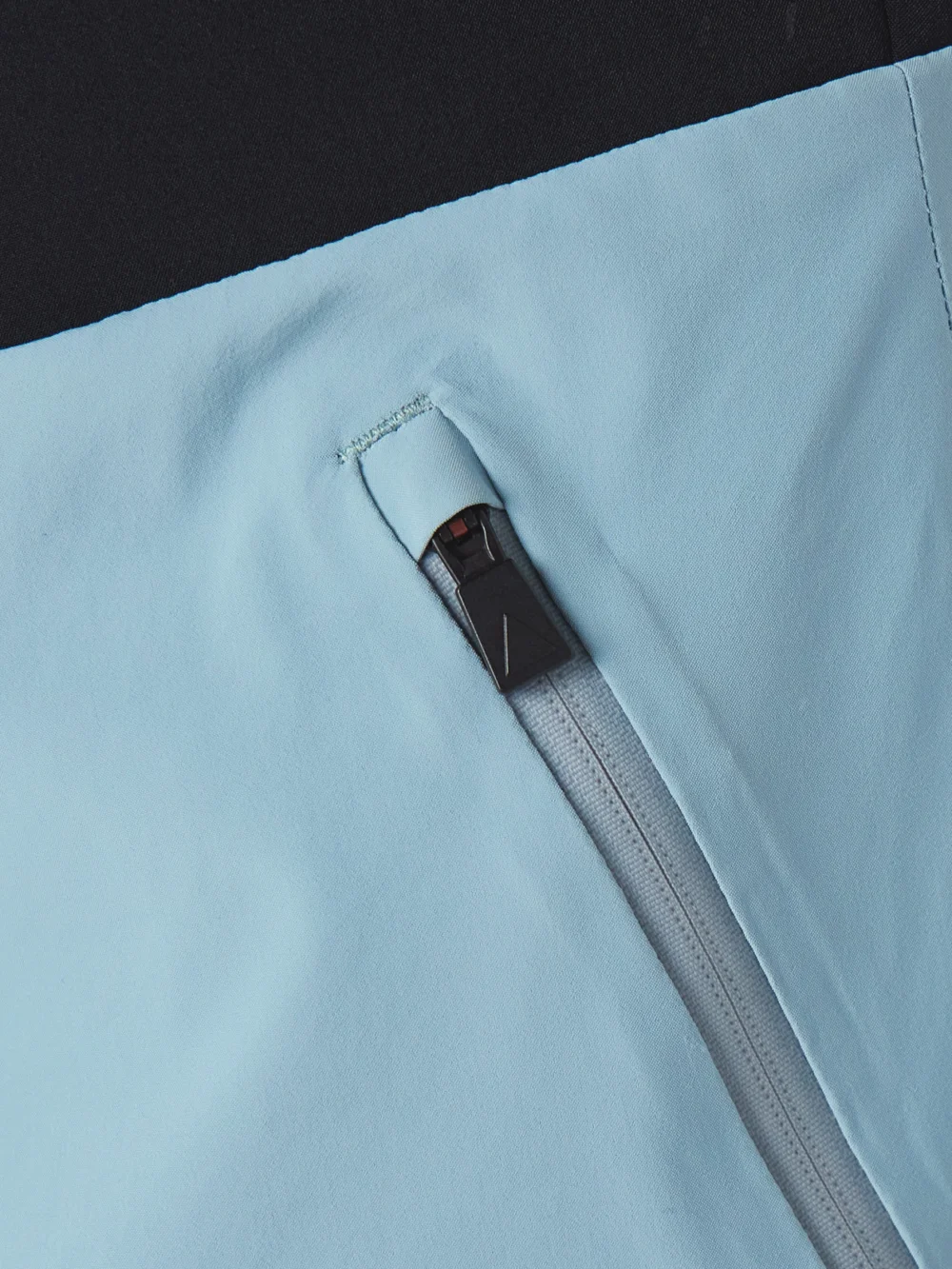 Close-up detail of the Aztech Mountain Top to Bottom Paneled Stretch Salopettes