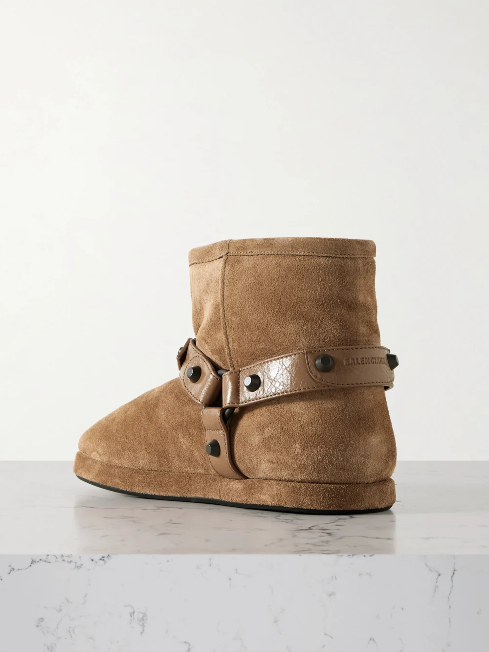 Back view of the Balenciaga Alaska Studded Leather-trimmed Fleece-lined Suede Ankle Boots