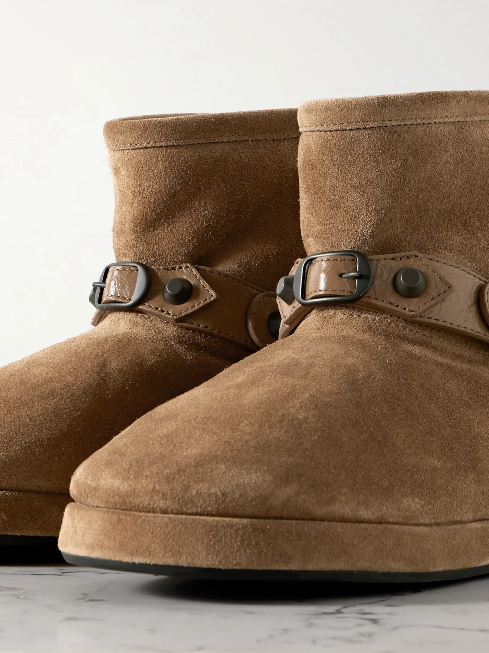 Close-up detail of the Balenciaga Alaska Studded Leather-trimmed Fleece-lined Suede Ankle Boots