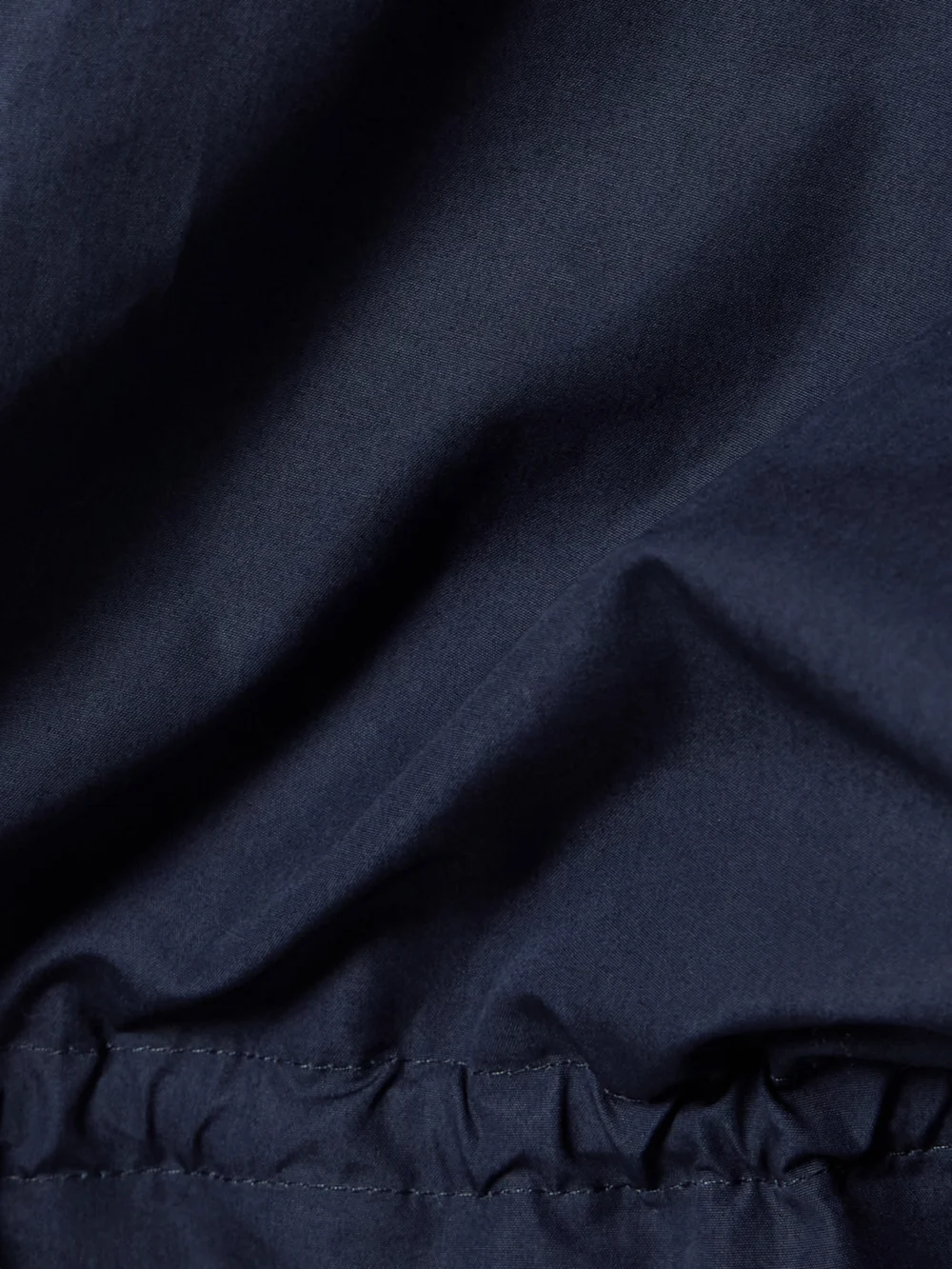 Close-up detail of the Balenciaga Asymmetric Gathered Cotton-poplin Mini Shirt Dress