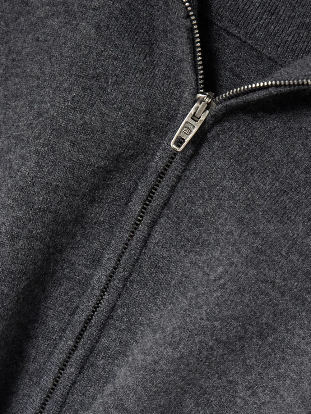 Close-up detail of the Balenciaga Back-to-front Wool-blend Turtleneck Sweater