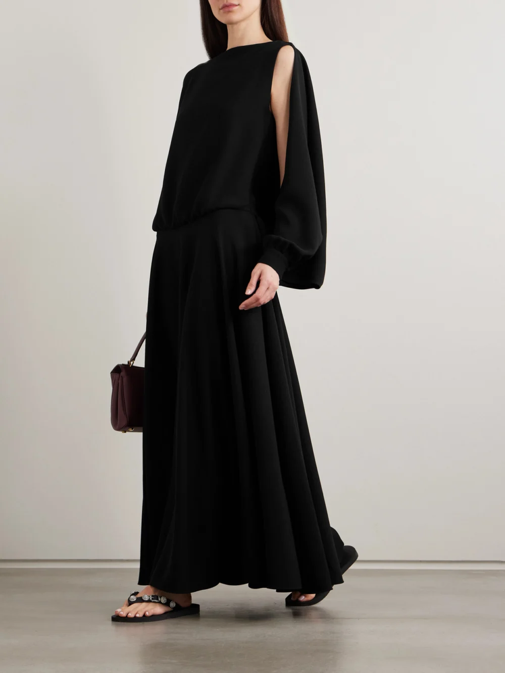 Balenciaga Balloon Gathered Draped Cutout Silk and Wool-blend Crepe Maxi Dress, worn by a model