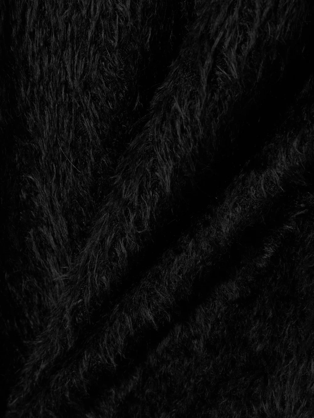 Close-up detail of the Balenciaga Belted Brushed-knit Turtleneck Mini Dress