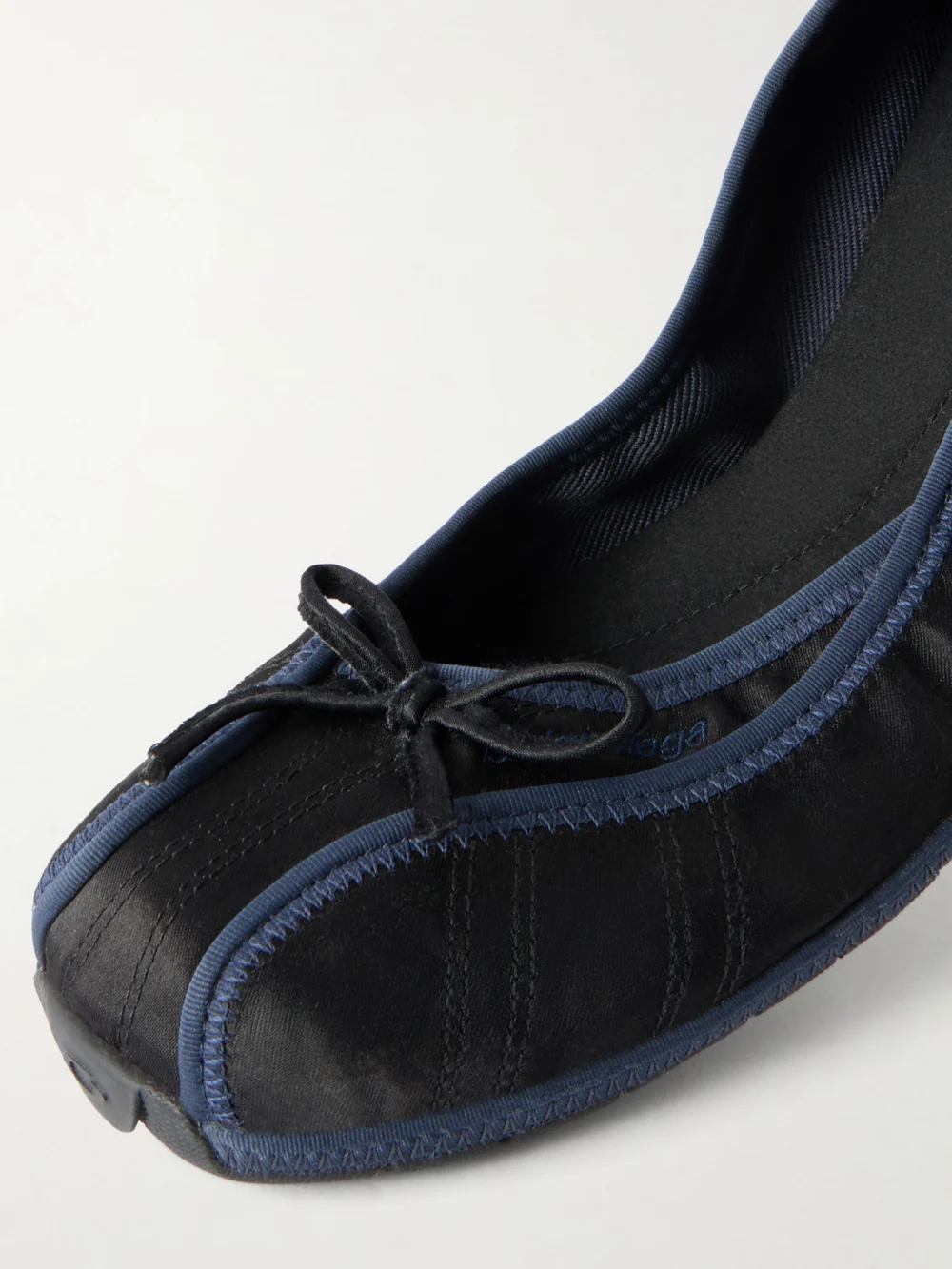 Close-up detail of the Balenciaga Bow-embellished Satin Ballet Sneakers