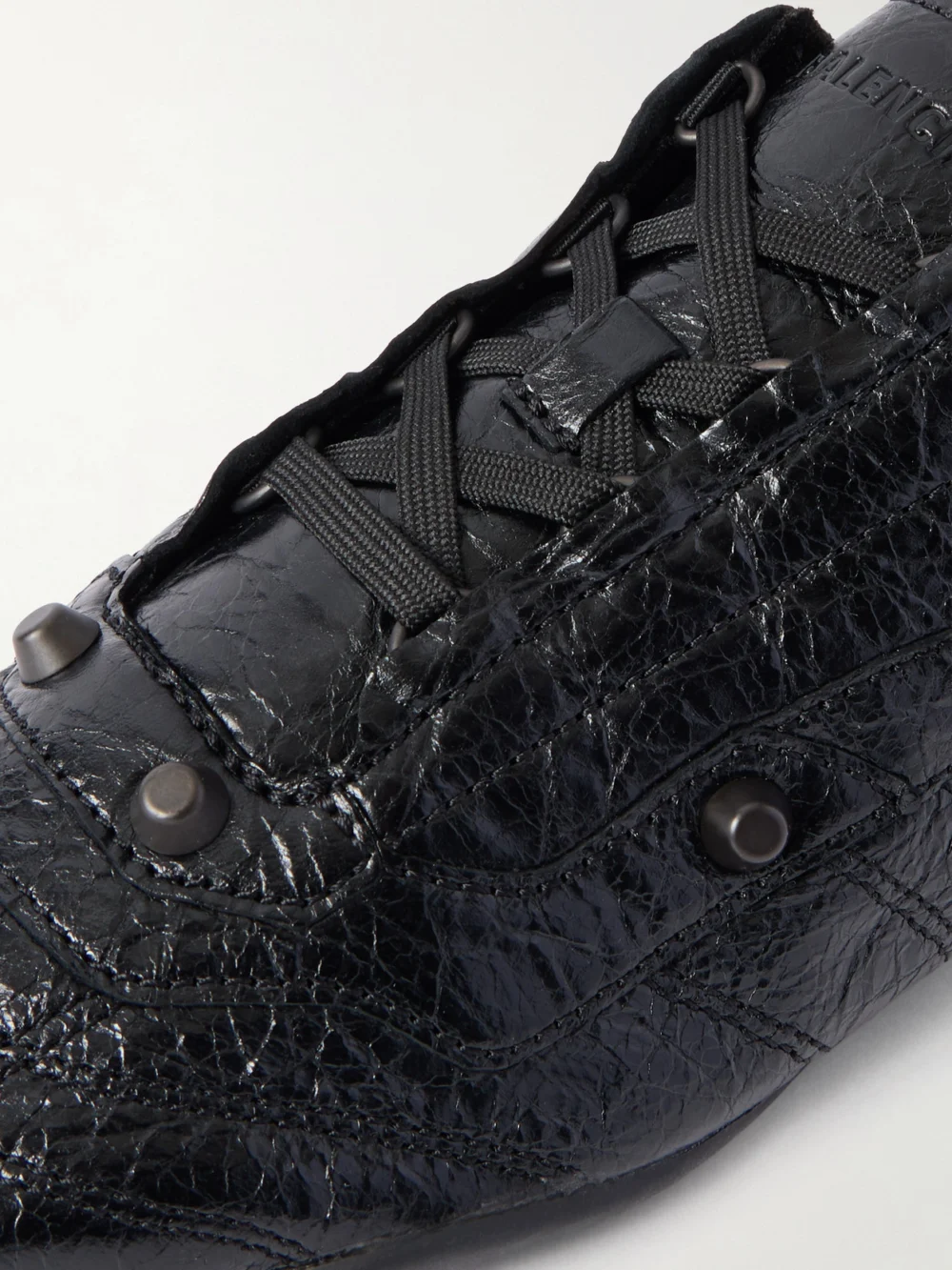 Close-up detail of the Balenciaga City Studded Crinkled-leather Sneakers