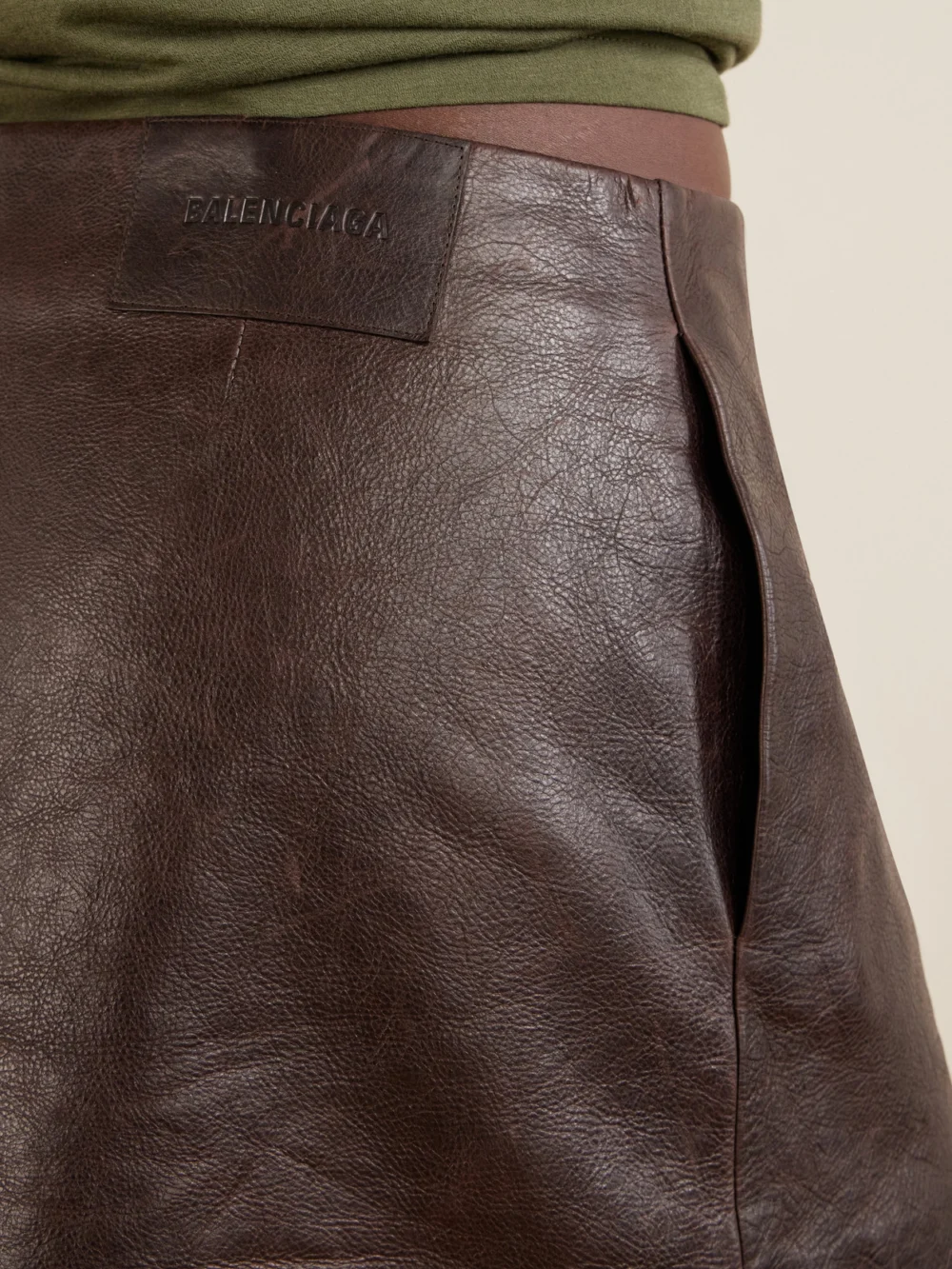 Close-up detail of the Balenciaga Crinkle Leather Mini Skirt