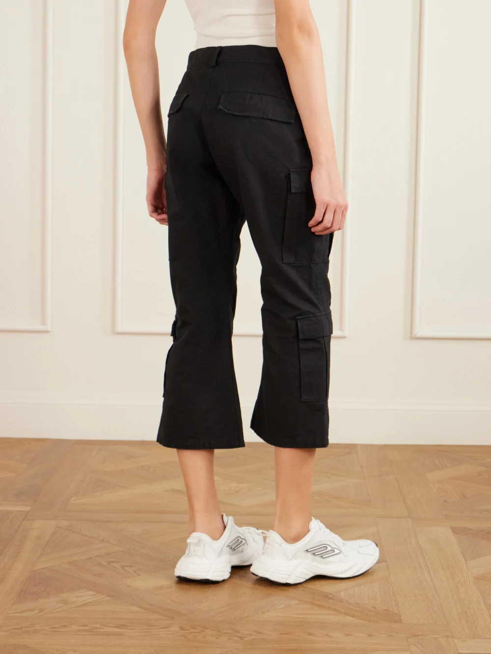 Back view of the Balenciaga Cropped Paneled Cotton-ripstop Flared Cargo Pants