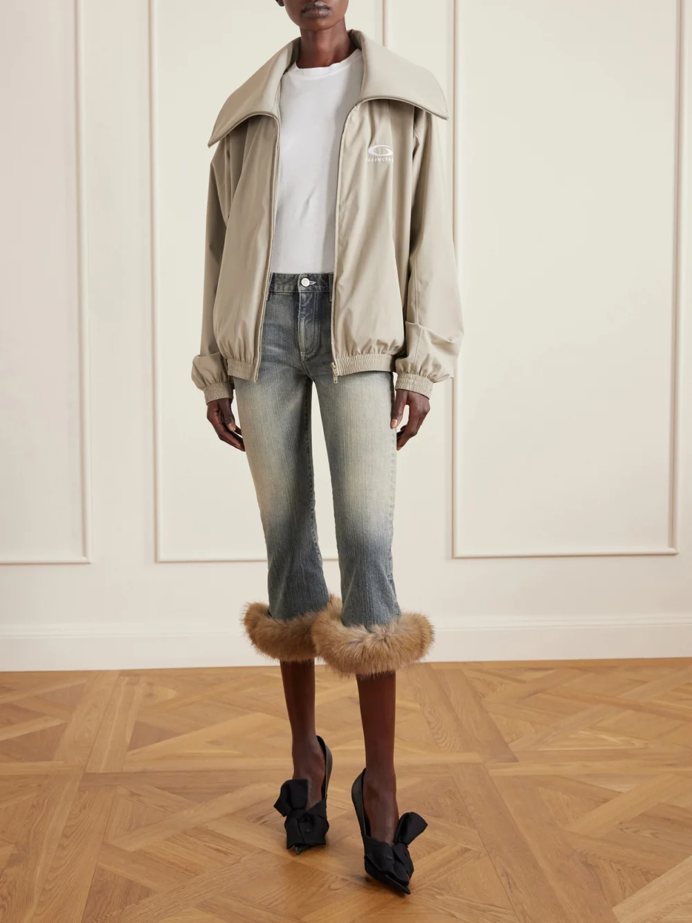 Balenciaga Cropped Plush-trimmed Low-rise Flared Jeans, worn by a model