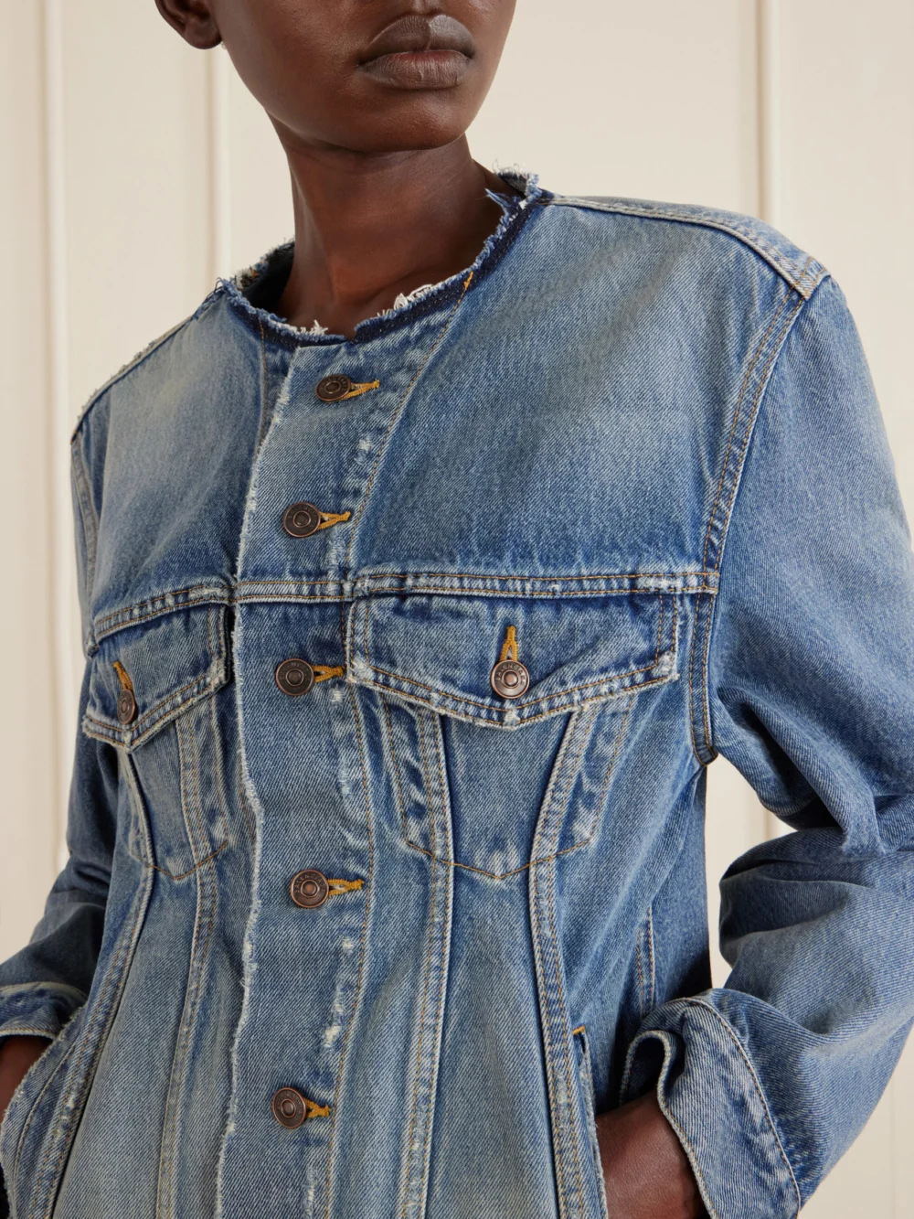 Close-up detail of the Balenciaga Distressed Denim Jacket
