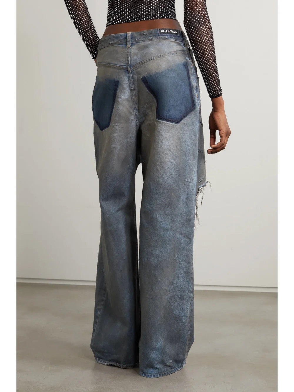 Back view of the Balenciaga Distressed High-rise Boyfriend Jeans