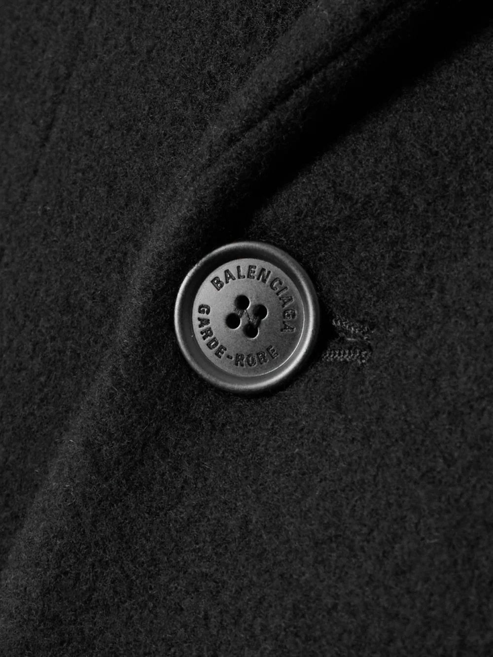 Close-up detail of the Balenciaga Double-breasted Brushed Wool-blend Coat