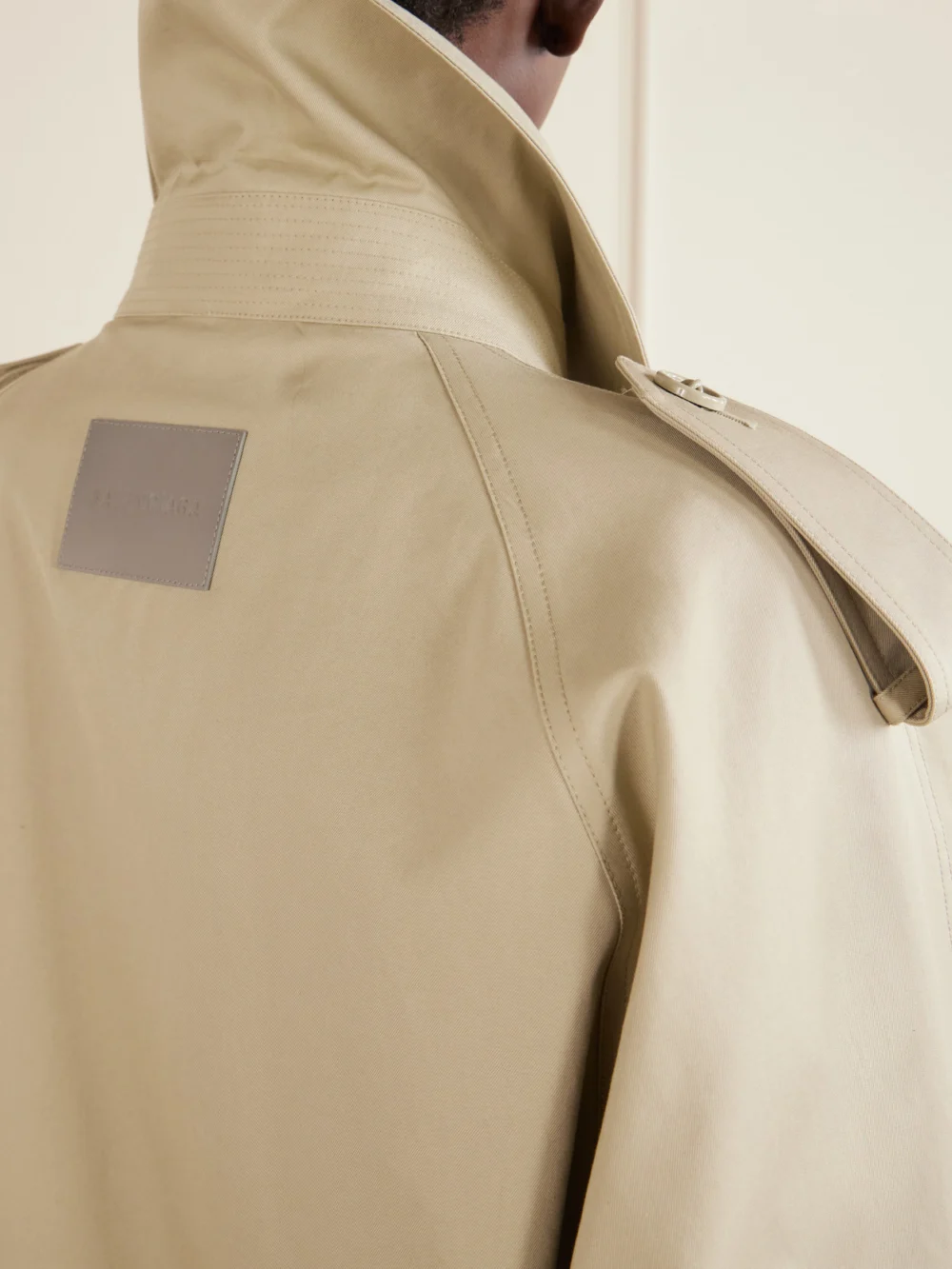 Close-up detail of the Balenciaga Double-breasted Cotton-gabardine Trench Coat