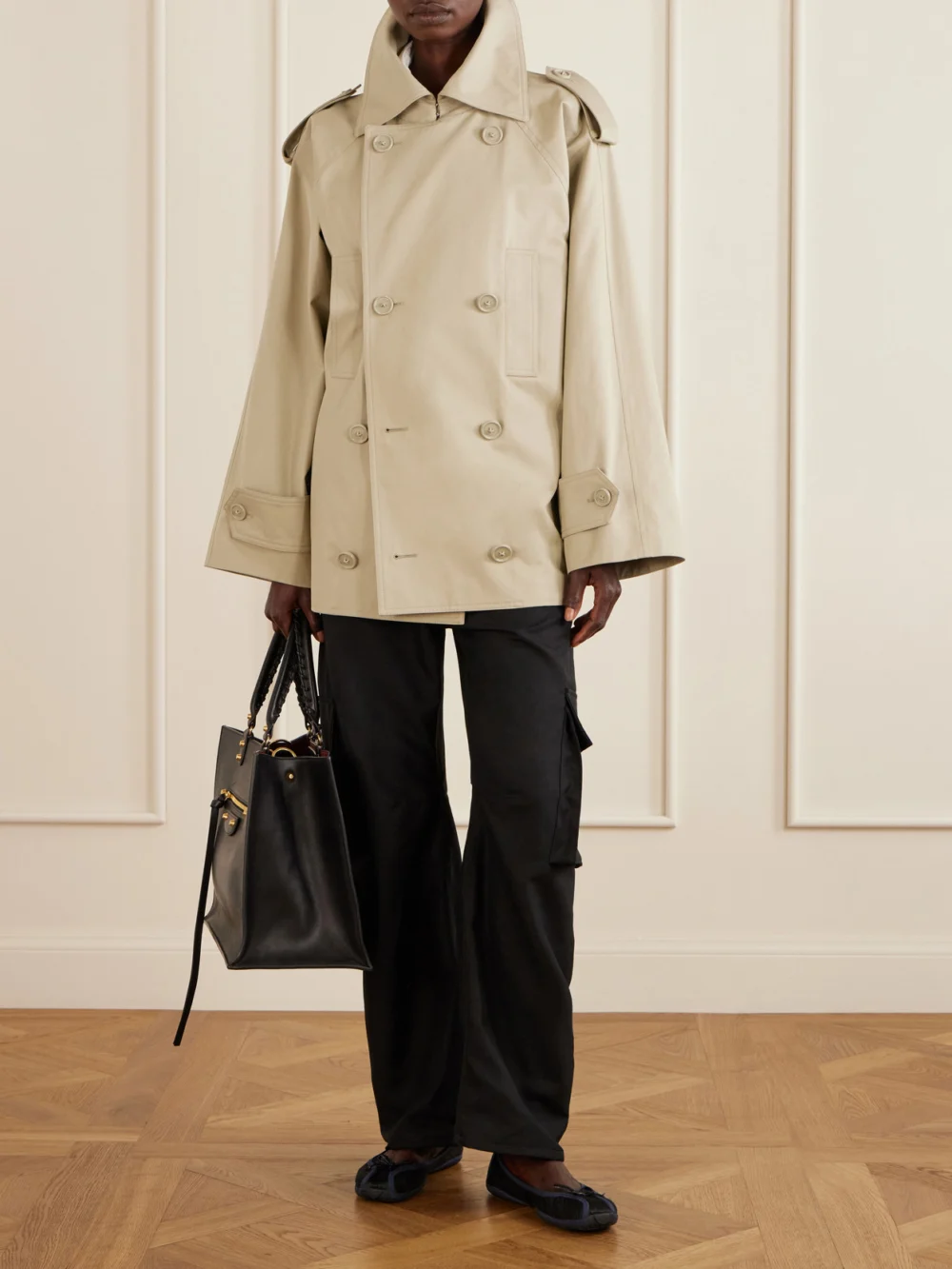 Balenciaga Double-breasted Cotton-gabardine Trench Coat, worn by a model