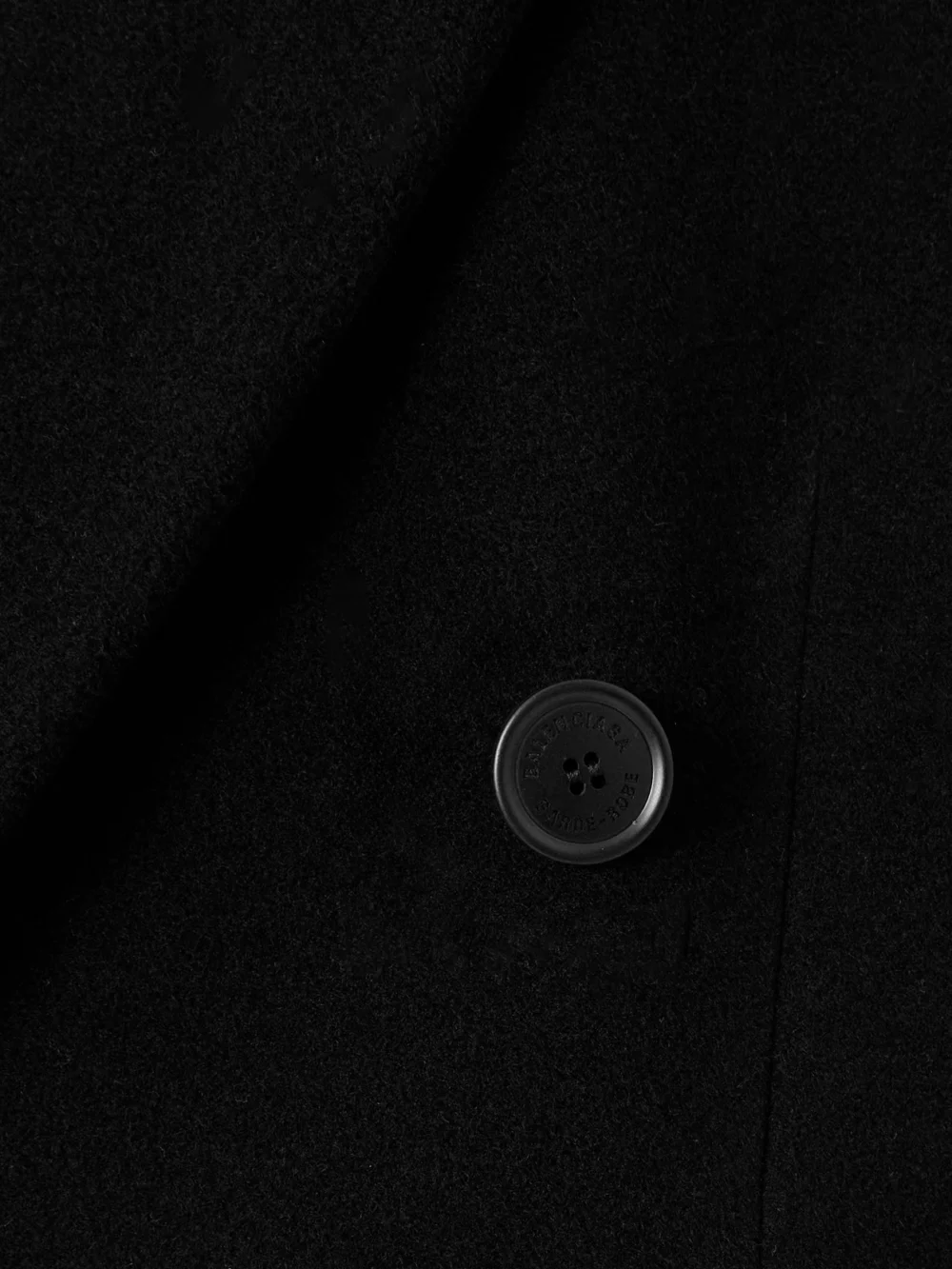 Close-up detail of the Balenciaga Double-breasted Oversized Cashmere and Wool-blend Coat