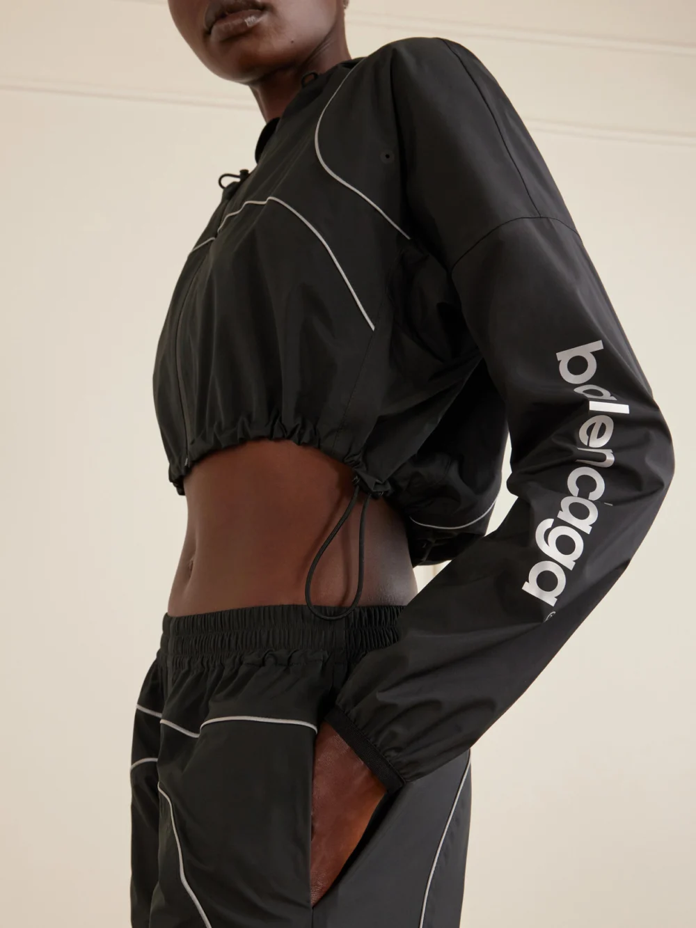 Close-up detail of the Balenciaga Embroidered Cropped Hooded Shell Jacket