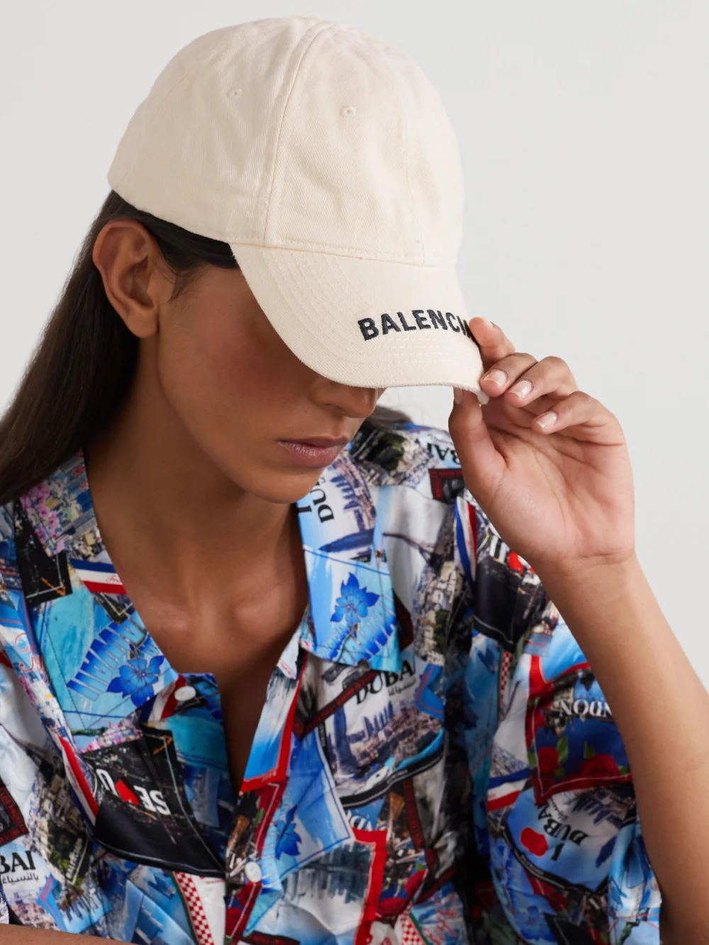 Balenciaga Embroidered Distressed Cotton-twill Baseball Cap, styled view