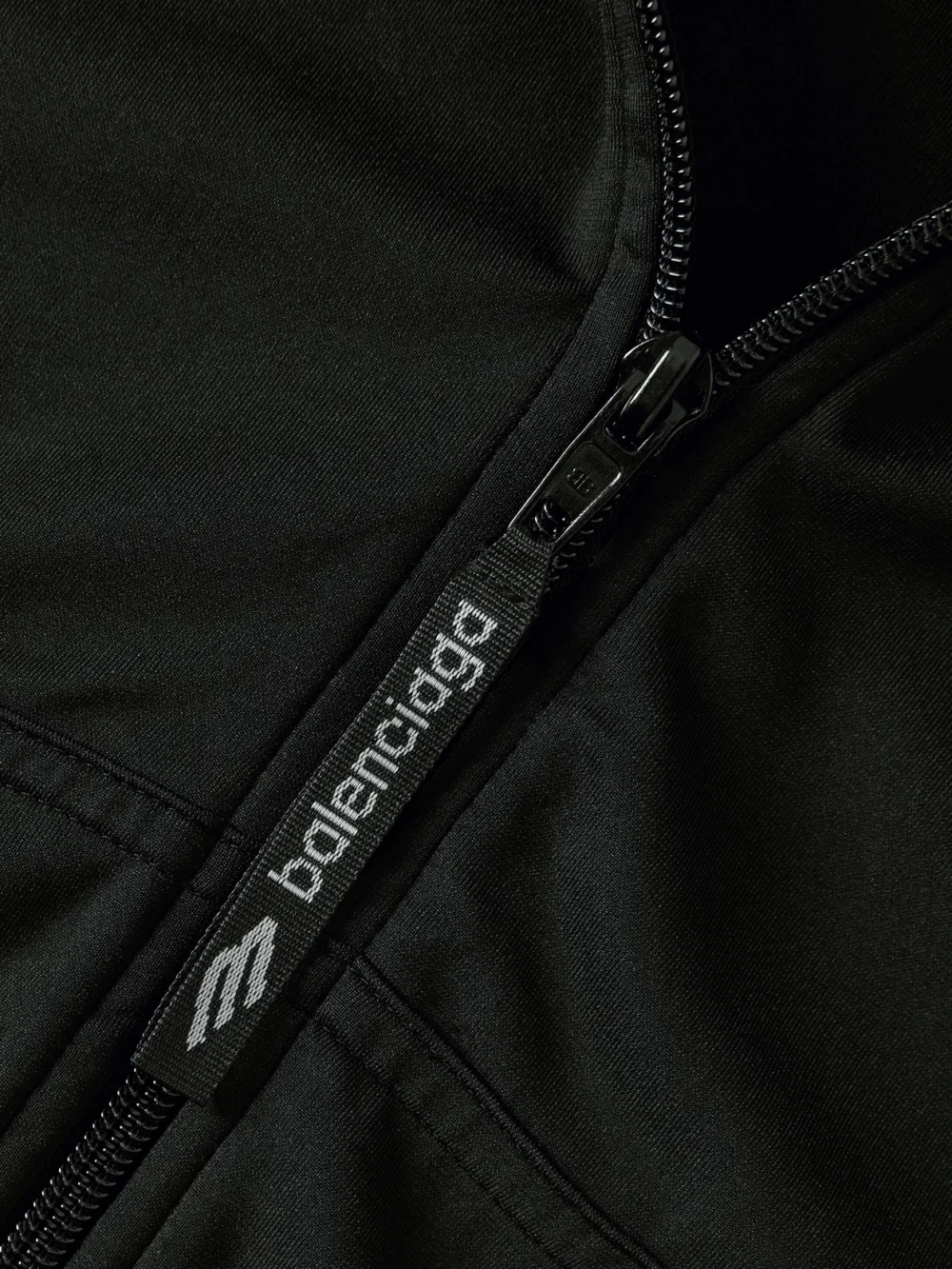 Close-up detail of the Balenciaga Embroidered Plush-trimmed Jersey Hoodie
