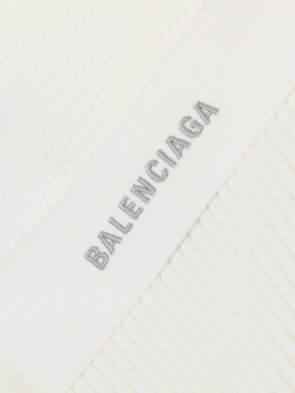Close-up detail of the Balenciaga Embroidered Ribbed Wool-blend Polo Shirt