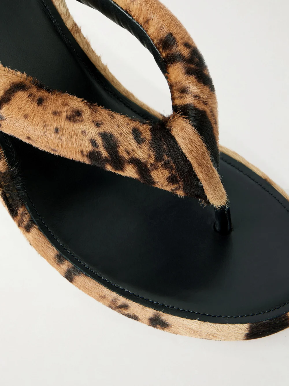 Close-up detail of the Balenciaga Gaeta Leopard-print Pony Hair Wedge Mules