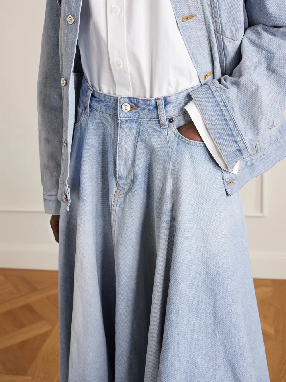 Close-up detail of the Balenciaga Godet Paneled Denim Maxi Skirt
