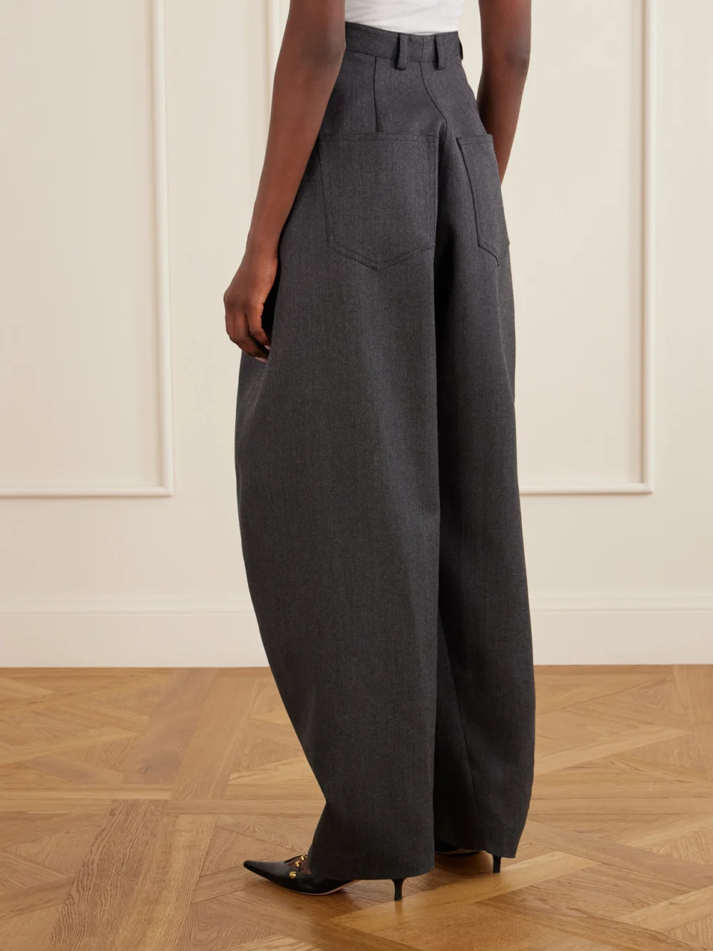 Back view of the Balenciaga High-waist Barrel-leg Wool Pants