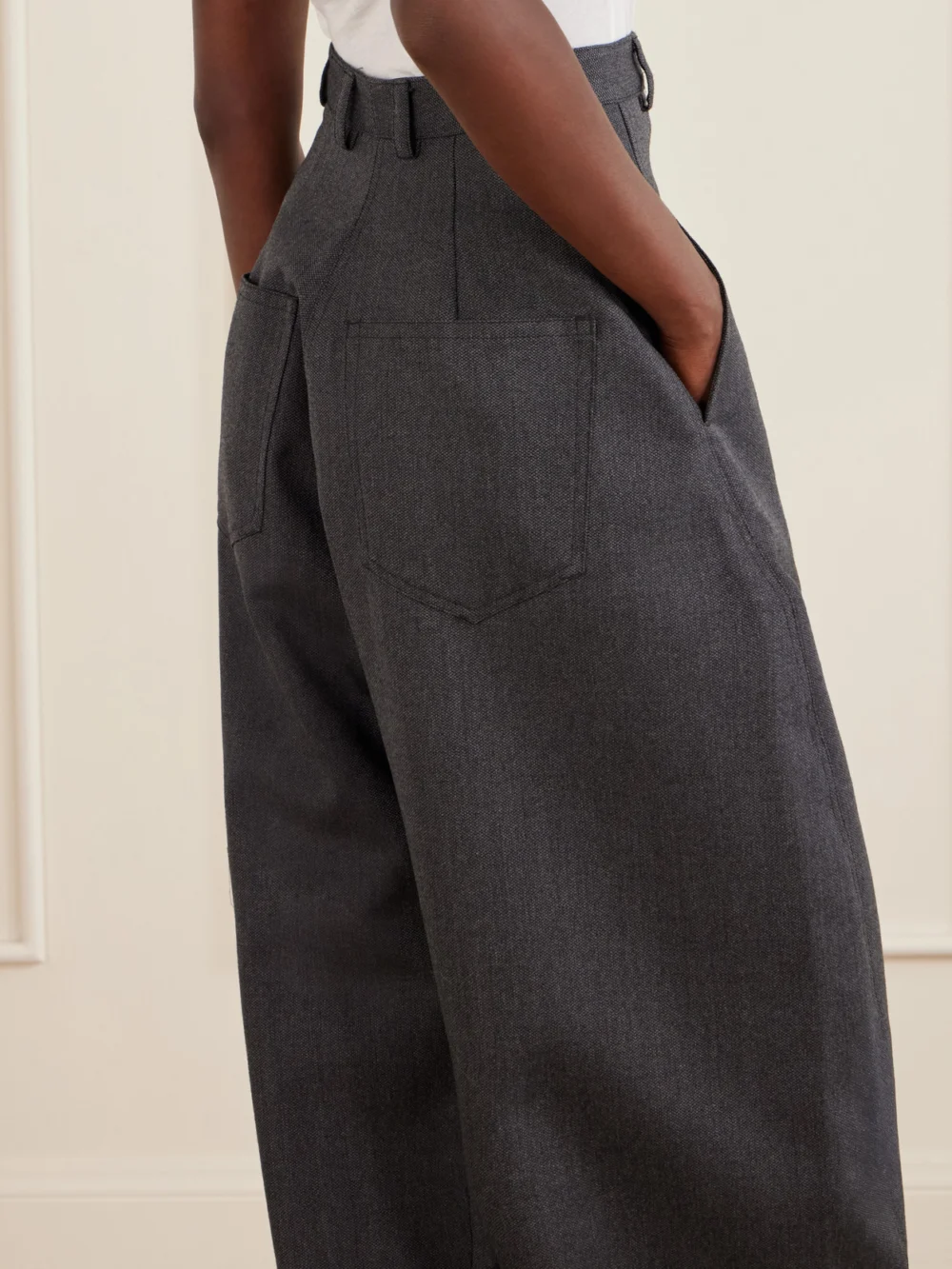 Close-up detail of the Balenciaga High-waist Barrel-leg Wool Pants