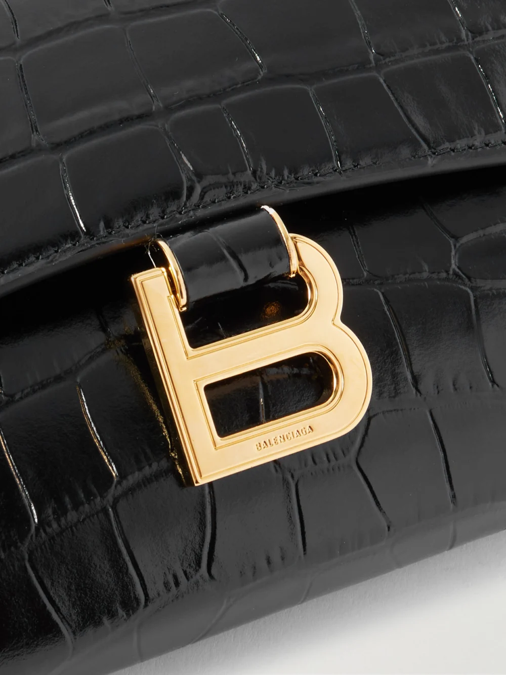 Close-up detail of the Balenciaga Hourglass Croc-effect Patent-leather Shoulder Bag