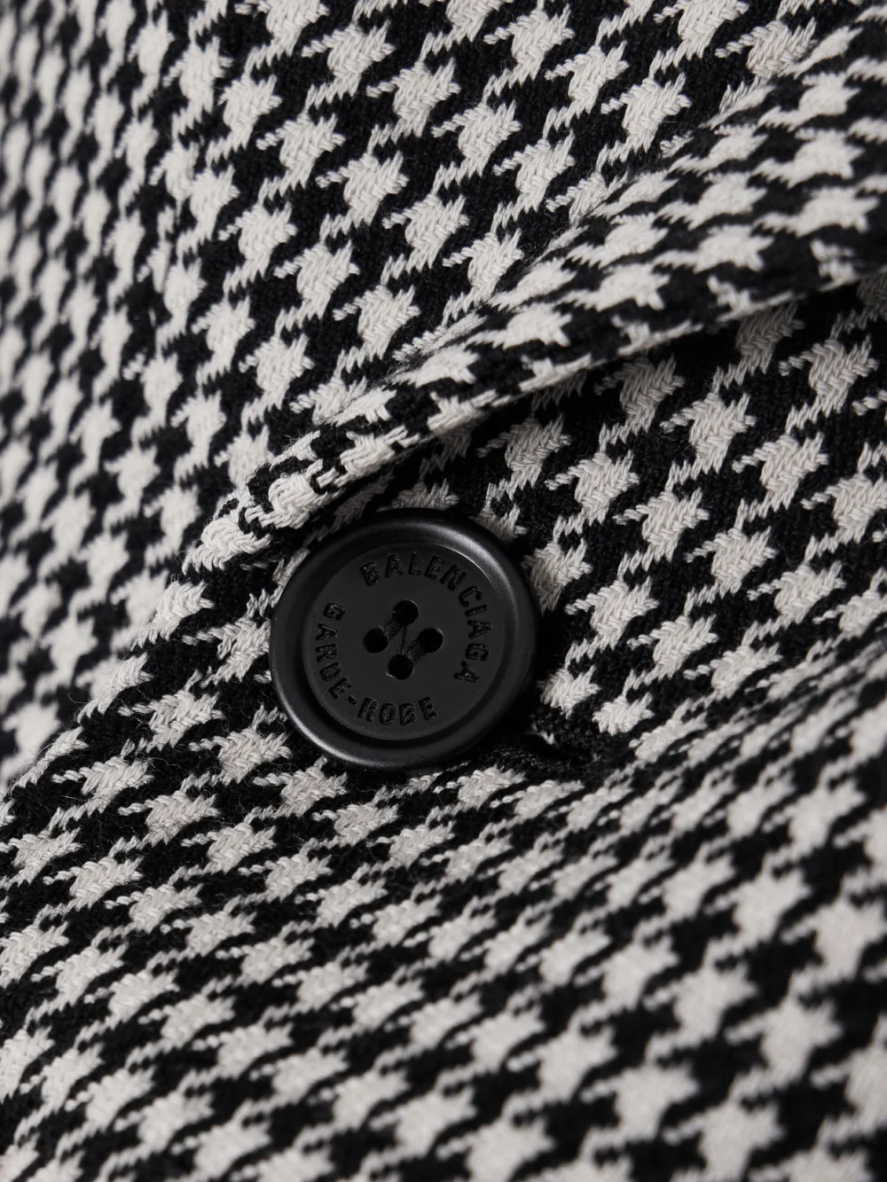 Close-up detail of the Balenciaga Hourglass Houndstooth Double-breasted Wool Blazer