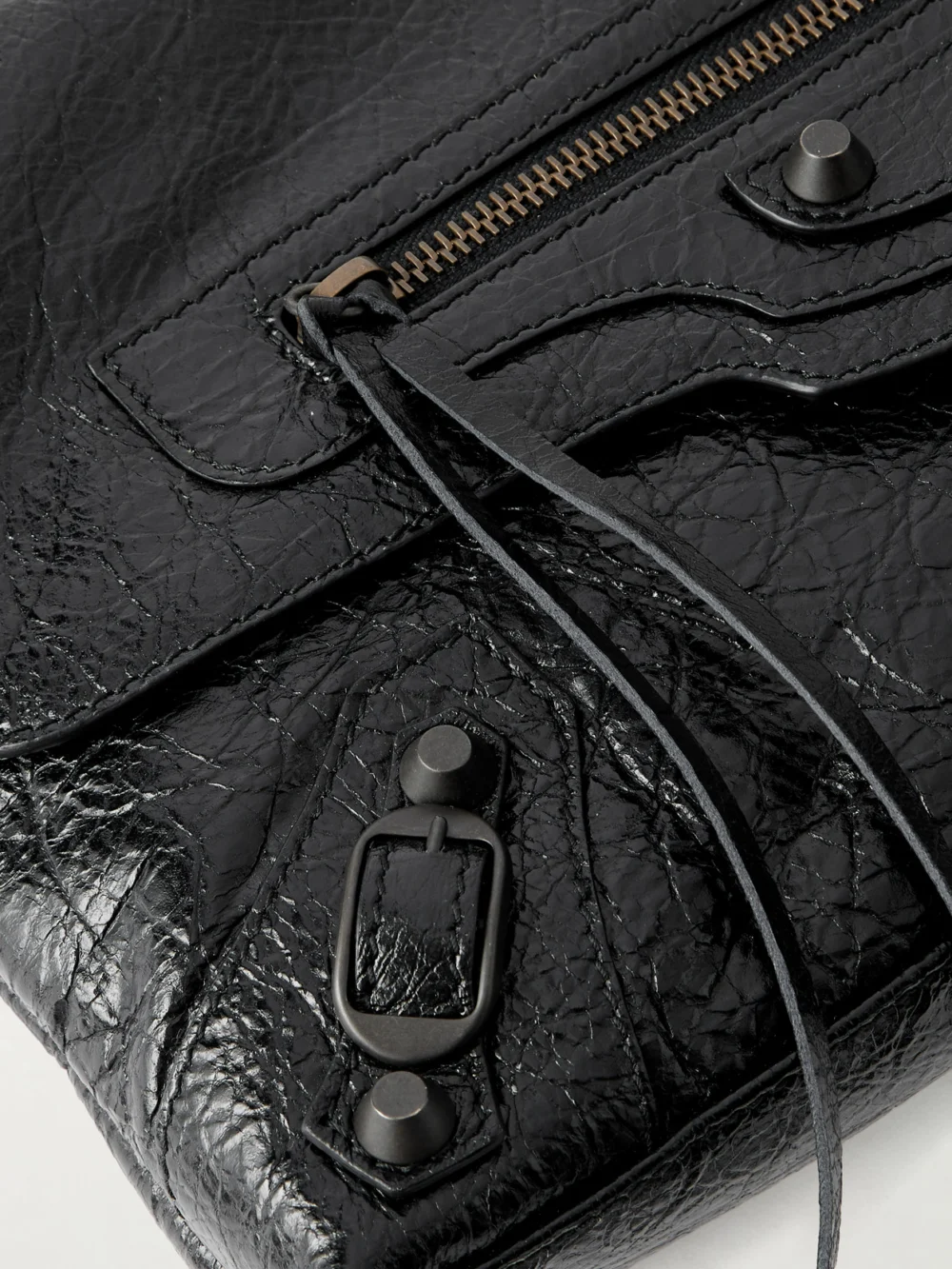 Close-up detail of the Balenciaga Le City Crinkled-leather Clutch
