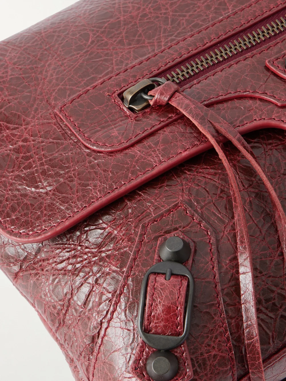 Close-up detail of the Balenciaga Le City Crinkled-leather Clutch