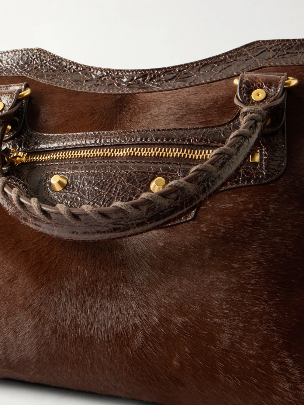 Close-up detail of the Balenciaga Le City Crinkled Leather-trimmed Pony Hair Shoulder Bag